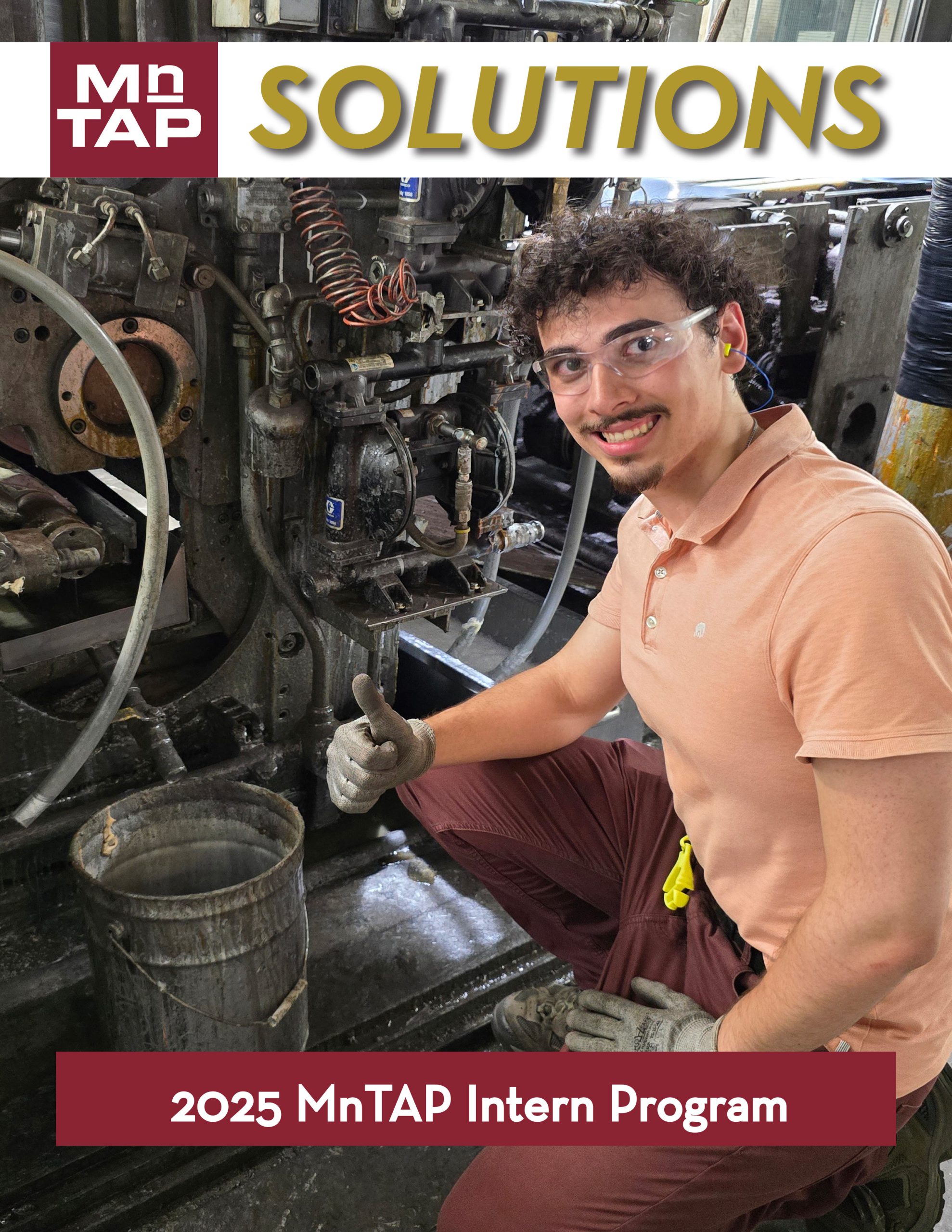 cover of solutions with intern next to machine wearing protective gloves, protective glasses, and ear plugs